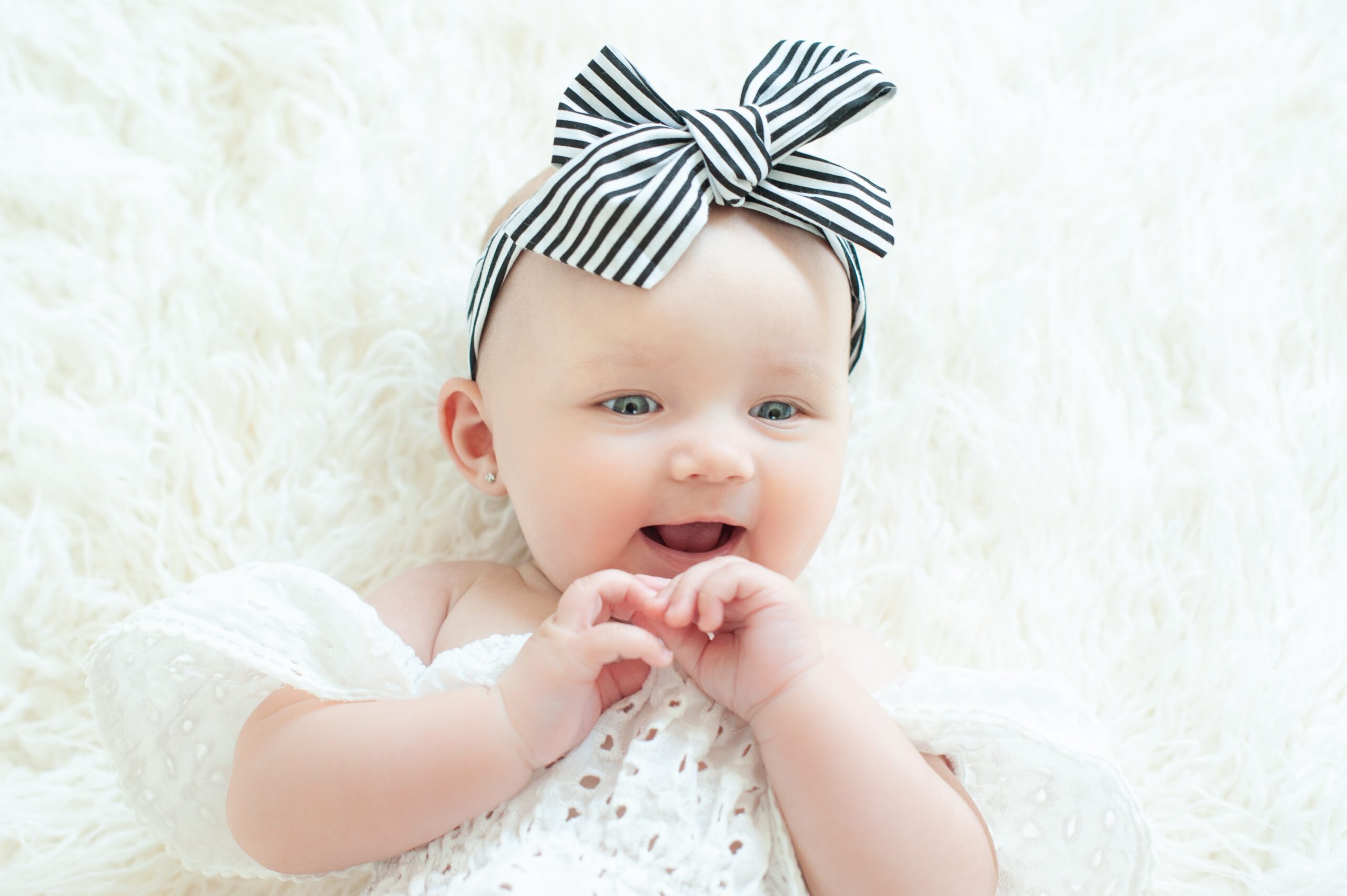 Baby girl with hair ribbon